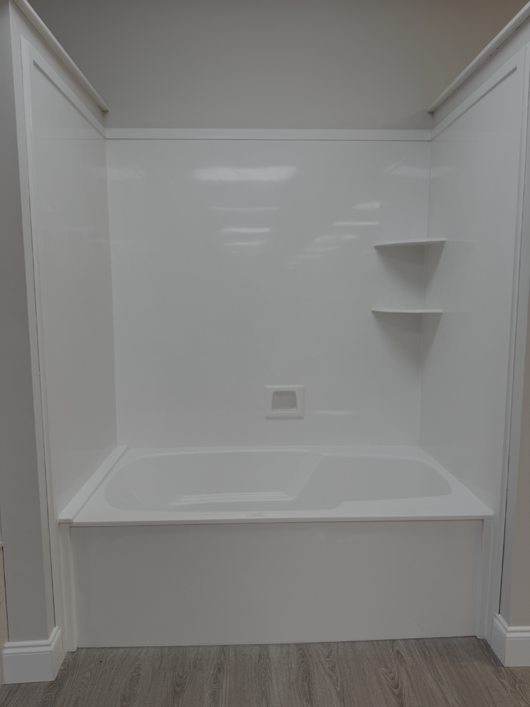 cast marble bathtub/shower combination at Top Marble's showroom