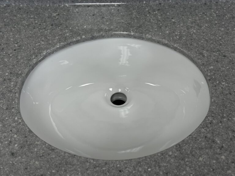 oval undermount sink and cast marble countertop